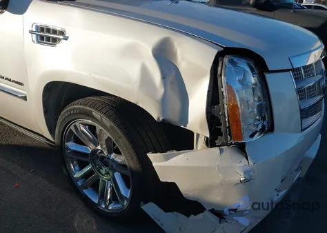 2011 Cadillac Escalade Platinum Edition z USA, uszkodzony, nr VIN 1GYS4DEFXBR266281